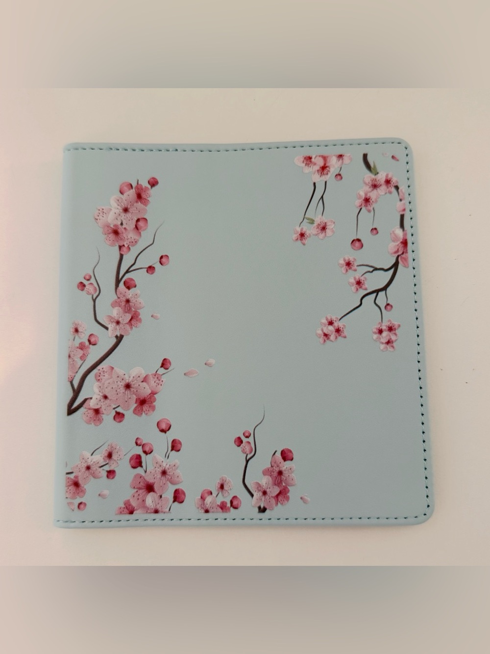 Pastel blue with cherry blossoms never used passport / card case